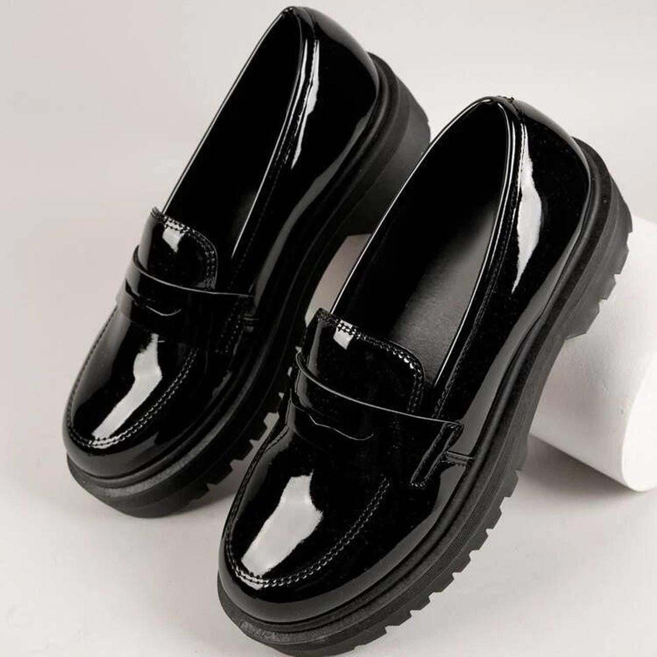 Black platform loafers