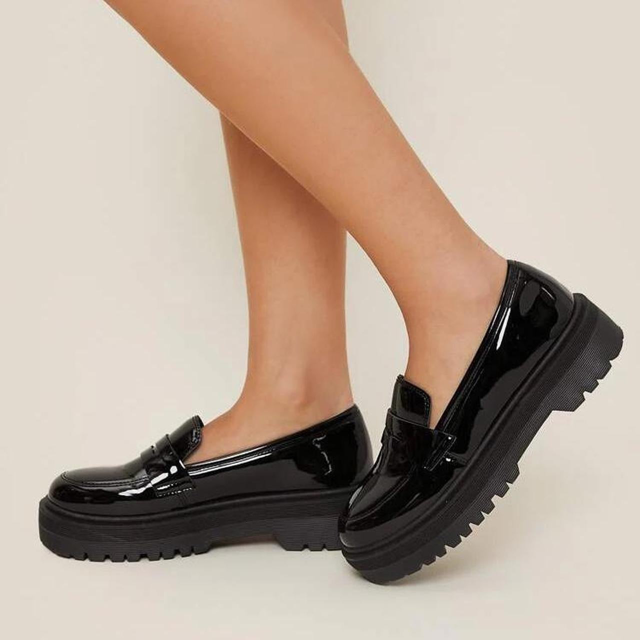 Black platform loafers